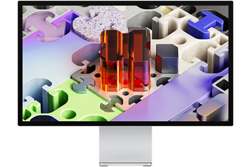 Front of Studio Display XDR with a three-dimensional puzzle-like wallpaper