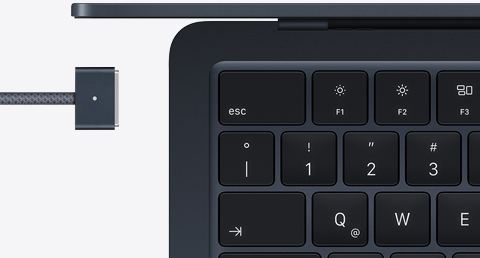 MacBook Air color medianoche con cable de carga MagSafe del mismo color